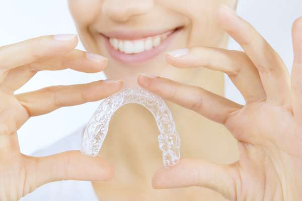 How Getting Invisalign® Can Improve Your Digestive Health from Roswell Dental Smiles in Roswell, GA